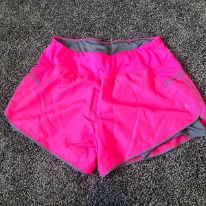 Pink and gray athletic shorts
